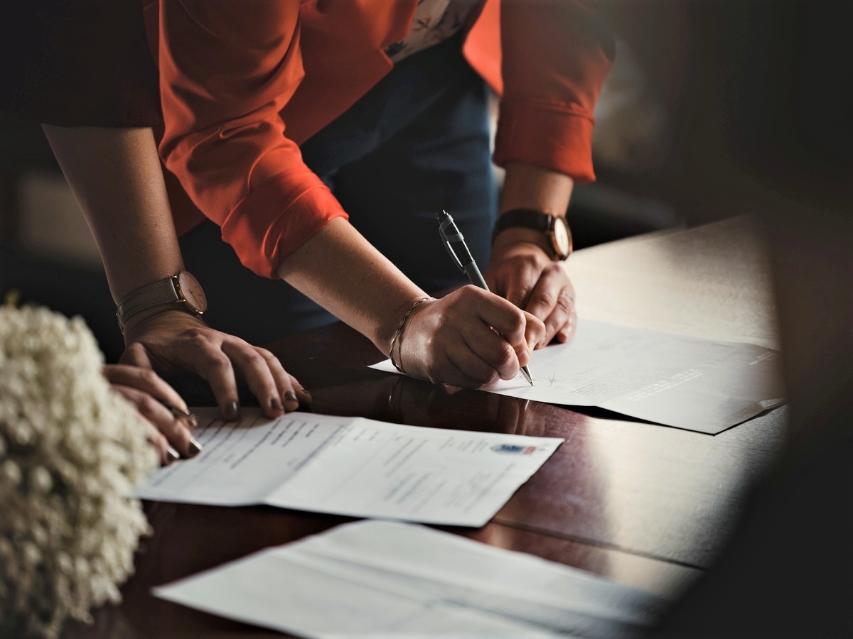 Signing documents for housing