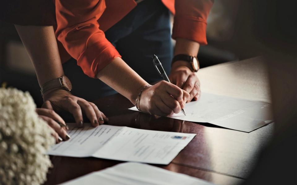 Signing documents for housing